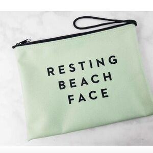 Milly mint green pouch.